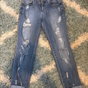 Distressed denim jeans